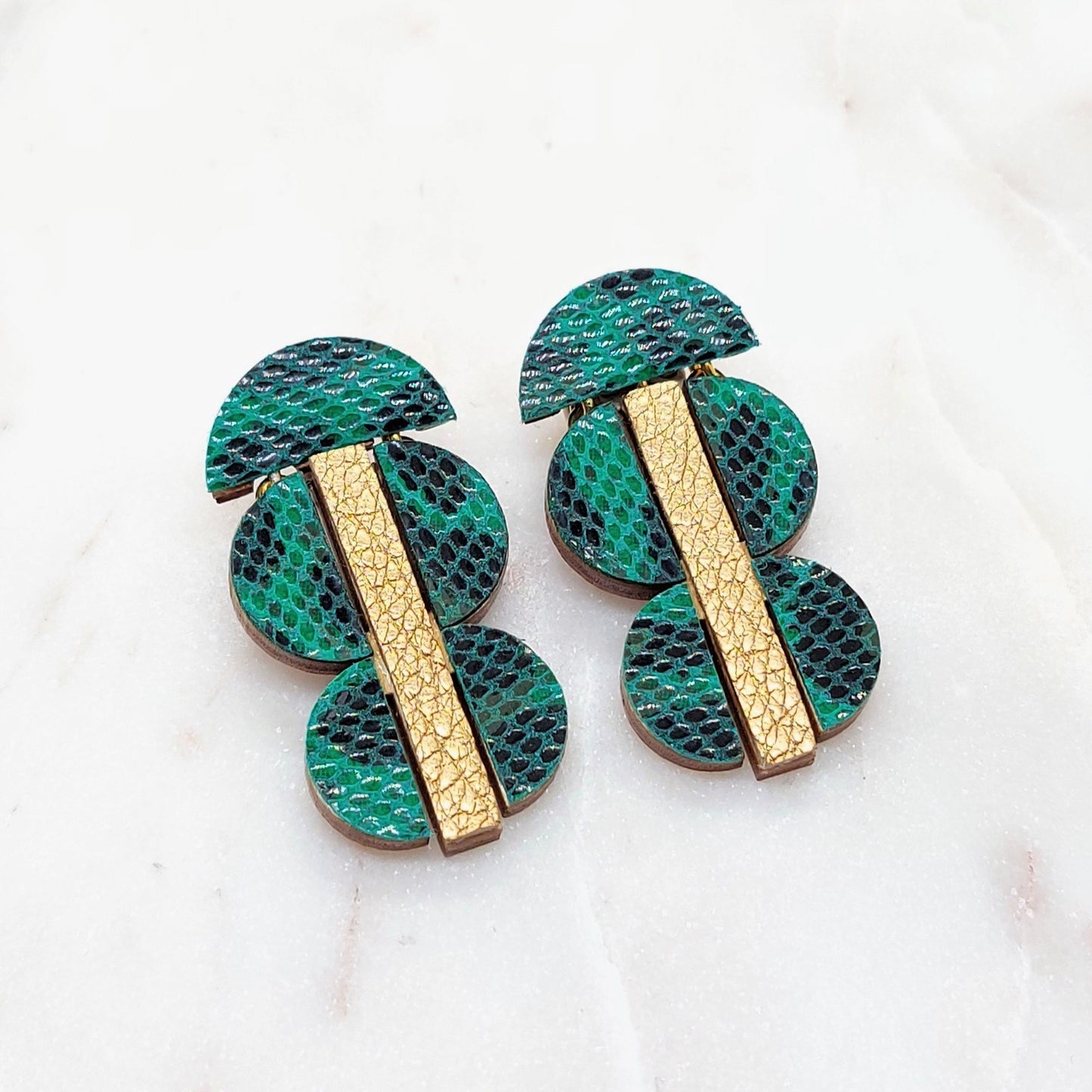 BOUCLES D'OREILLES MI CUIR MIX