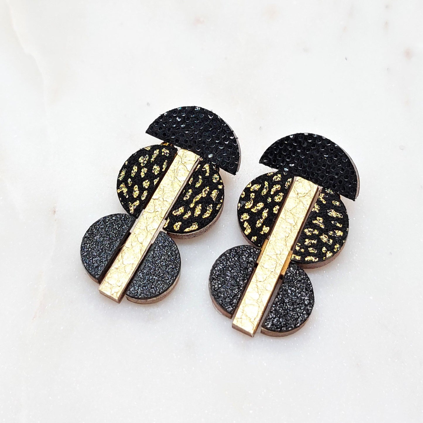 BOUCLES D'OREILLES MI CUIR MIX