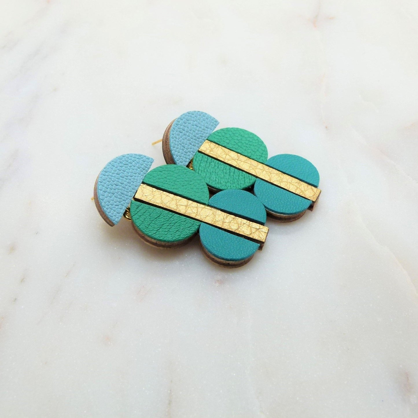 BOUCLES D'OREILLES MI CUIR MIX